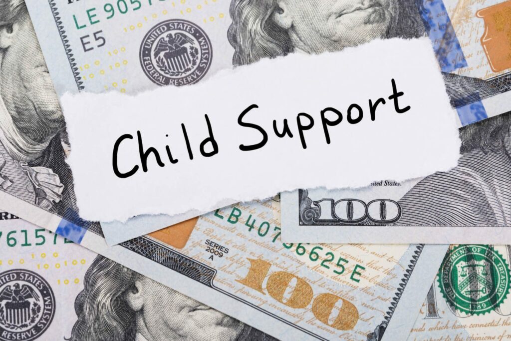 child-support-payment-hundred-dollar-bills