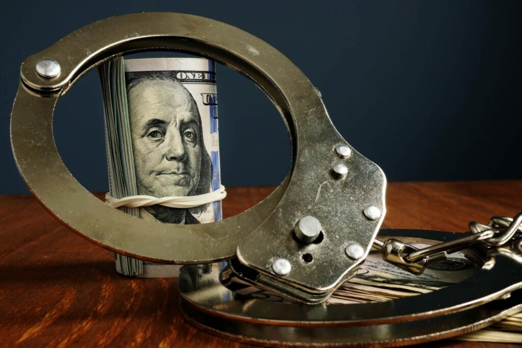 Money For Bail Under Handcuffs