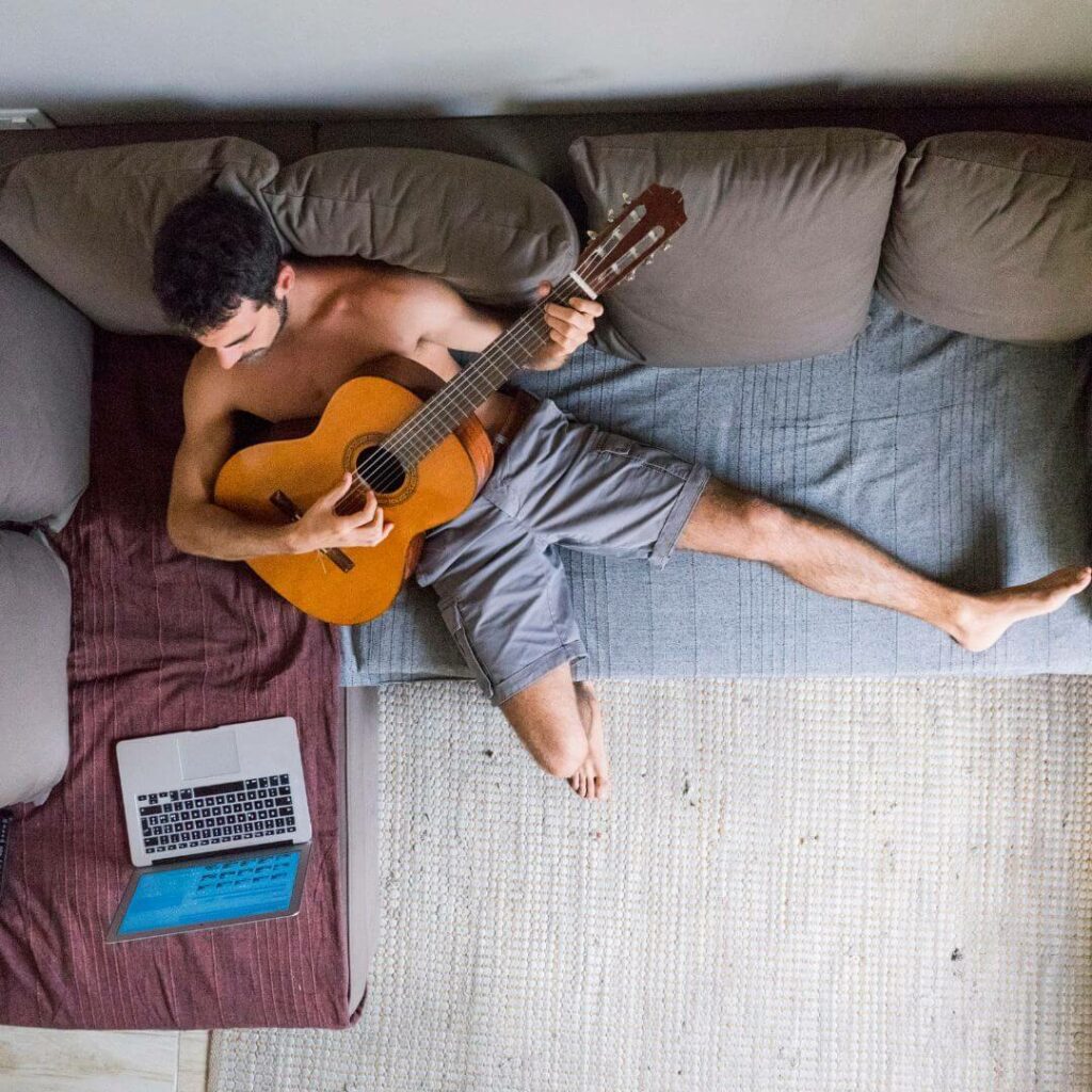 playing guitar out on bail